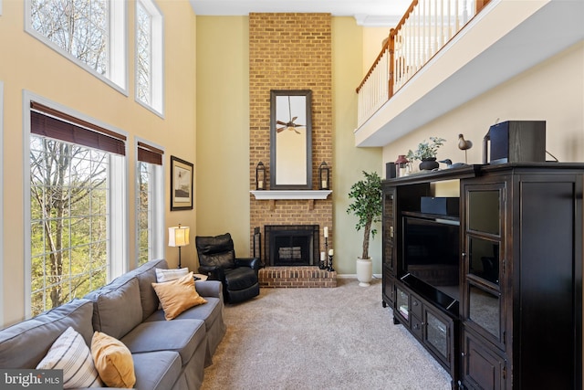 109 Aulee Ct, Winchester, VA 22602 - living room with carpet floors, a towering ceiling, and a fireplace