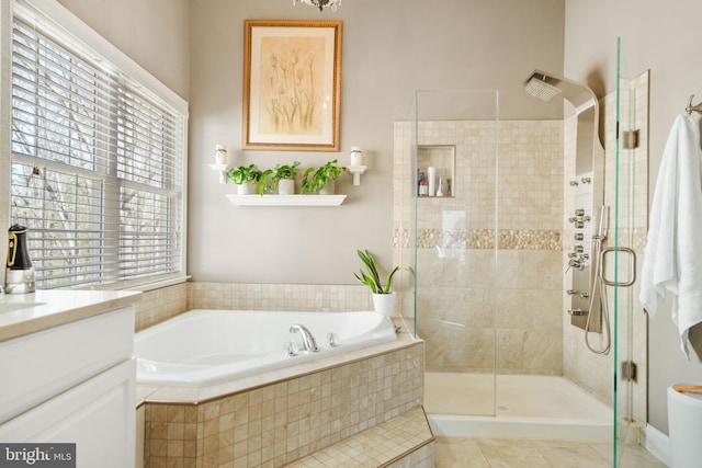 109 Aulee Ct, Winchester, VA 22602 - bathroom with a shower stall, a garden tub, vanity, and tile patterned flooring