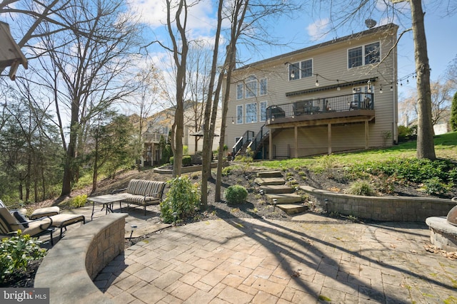 109 Aulee Ct, Winchester, VA 22602 - back of property featuring an outdoor hangout area, a patio, stairs, and a deck
