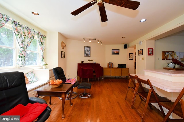dining area with ceiling fan, recessed lighting, and wood finished floors
