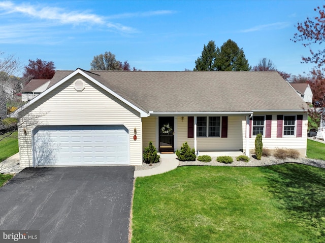 ranch-style home featuring a front yard, a garage, driveway, and roof with shingles