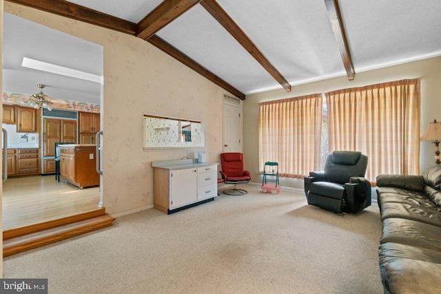 1113 Janice Ct, Joppa, MD 21085 - living room featuring light colored carpet, baseboards, and lofted ceiling with beams