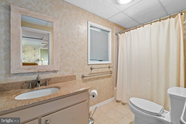 1113 Janice Ct, Joppa, MD 21085 - bathroom featuring vanity, shower / tub combo with curtain, toilet, baseboards, and tile patterned floors