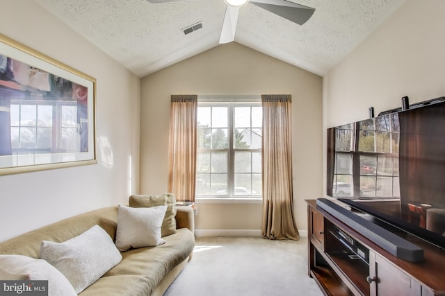 10107 Linford Ter, Lanham, MD 20706 - living area with light carpet, a textured ceiling, visible vents, lofted ceiling, and ceiling fan