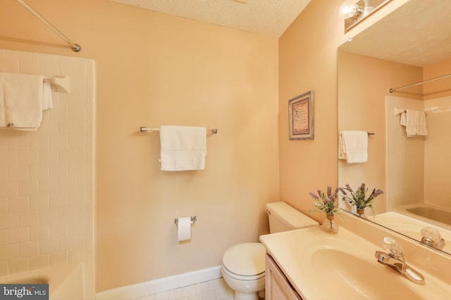 10107 Linford Ter, Lanham, MD 20706 - full bath with baseboards, toilet, a textured ceiling, vanity, and shower / bath combination