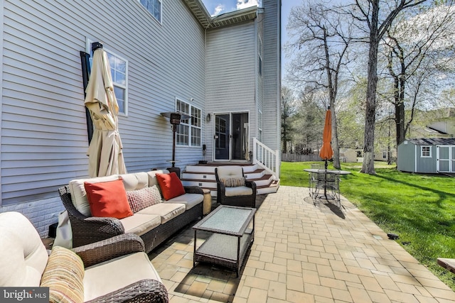 10107 Linford Ter, Lanham, MD 20706 - view of patio with a storage shed, an outbuilding, and an outdoor hangout area