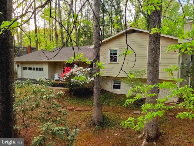 exterior space featuring a garage