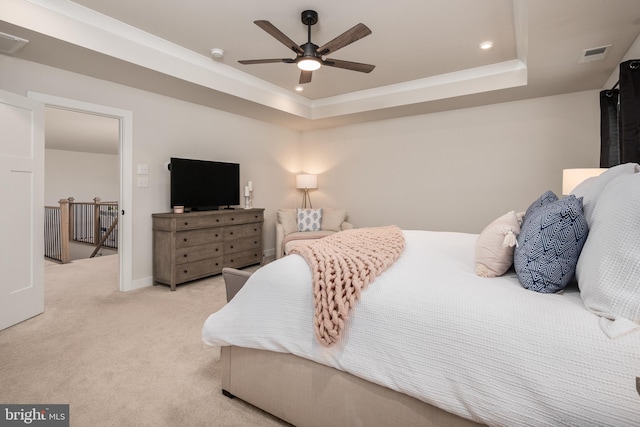 bedroom with a ceiling fan, visible vents, carpet floors, a tray ceiling, and recessed lighting