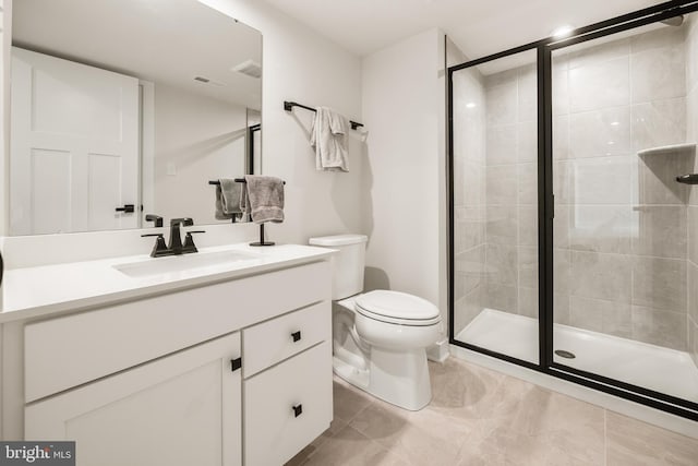 full bath featuring tile patterned flooring, vanity, toilet, visible vents, and a stall shower
