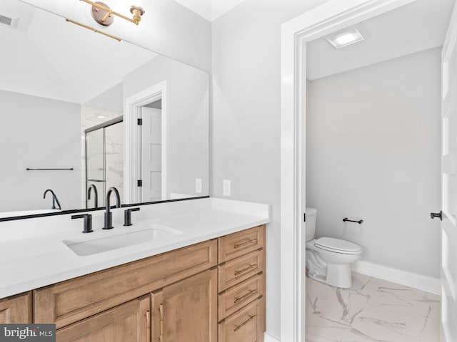 full bath with vanity, baseboards, a stall shower, toilet, and marble finish floor