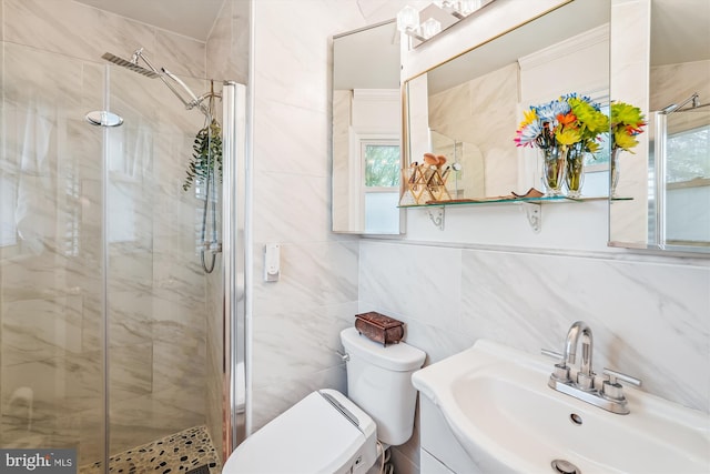 bathroom featuring tile walls, a stall shower, and a healthy amount of sunlight