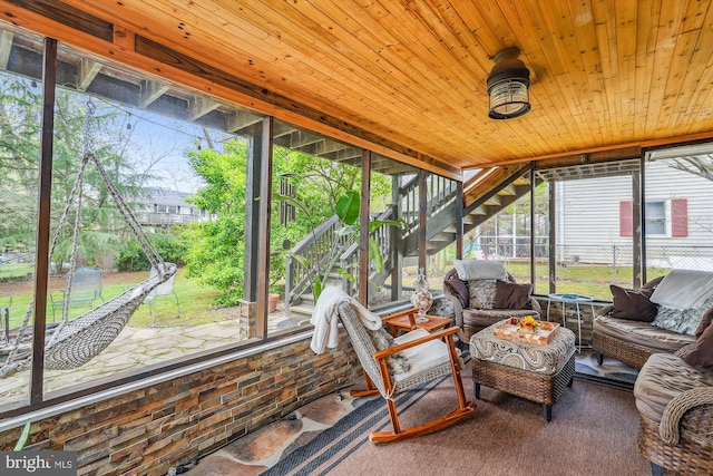 sunroom / solarium with an outdoor hangout area