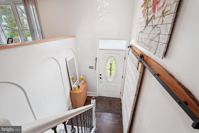 foyer entrance featuring wood finished floors