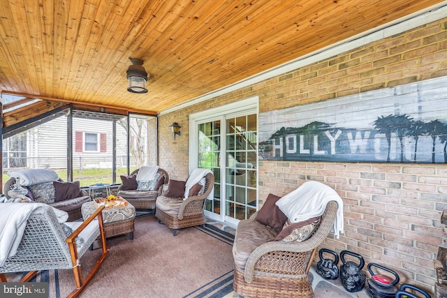 sunroom / solarium with an outdoor living space