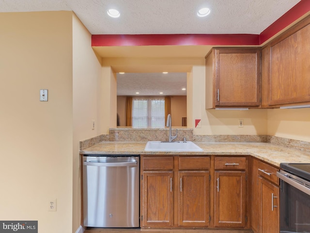 653 Willowby Run, Pasadena, MD 21122 - kitchen featuring brown cabinets, recessed lighting, stainless steel appliances, and a sink
