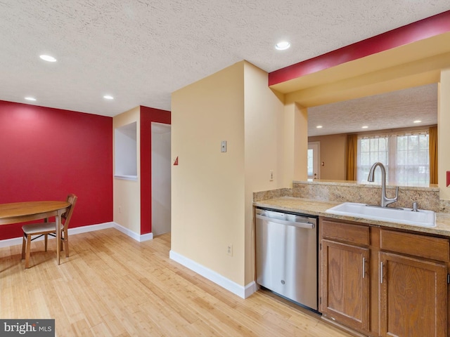 653 Willowby Run, Pasadena, MD 21122 - kitchen with brown cabinets, recessed lighting, dishwasher, a sink, and light wood-style flooring