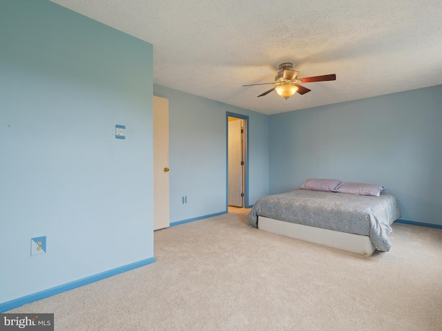 653 Willowby Run, Pasadena, MD 21122 - carpeted bedroom featuring baseboards, a textured ceiling, and ceiling fan