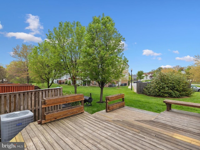 653 Willowby Run, Pasadena, MD 21122 - deck with a lawn and central AC