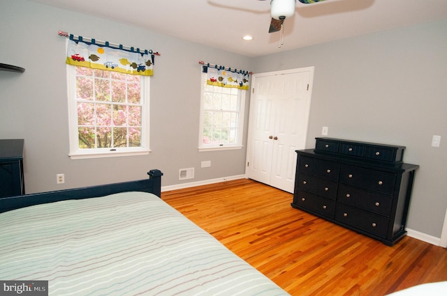 7 Briarwood Dr, Princeton Junction, NJ 08550 - bedroom featuring baseboards, a closet, wood finished floors, and visible vents