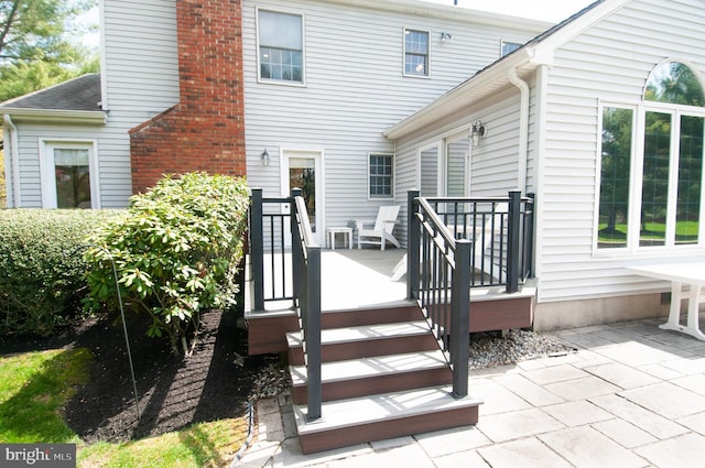 7 Briarwood Dr, Princeton Junction, NJ 08550 - back of house with a patio and a chimney