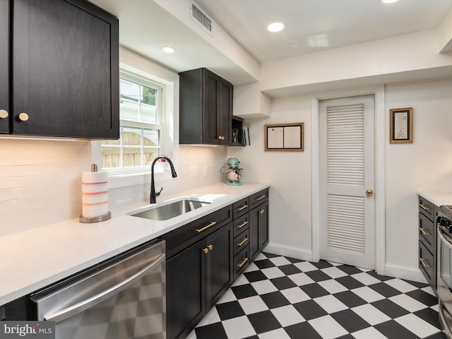15 Morris St, Annapolis, MD 21401 - kitchen featuring appliances with stainless steel finishes, a sink, dark flooring, and light countertops