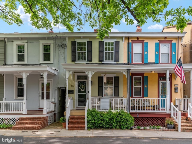 15 Morris St, Annapolis, MD 21401 - townhome / multi-family property with covered porch and stucco siding