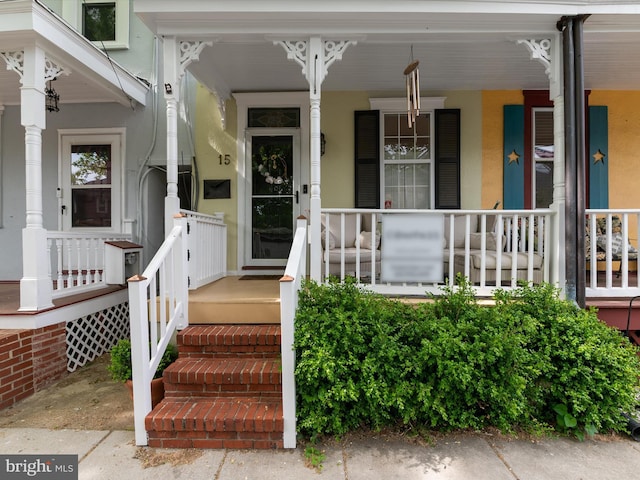 15 Morris St, Annapolis, MD 21401 - view of exterior entry with covered porch and stucco siding