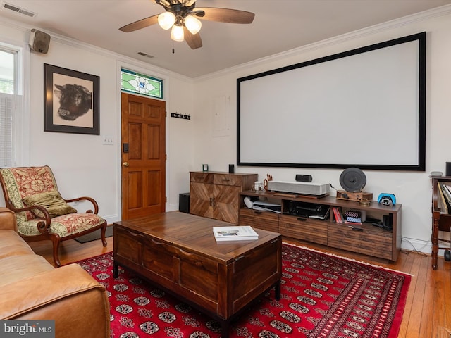 15 Morris St, Annapolis, MD 21401 - home theater room featuring hardwood / wood-style floors, a ceiling fan, ornamental molding, and baseboards