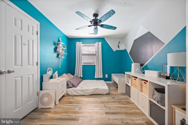 bedroom featuring ceiling fan and light wood-style floors