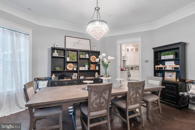 9136 Cowenton Ave, Perry Hall, MD 21128 - dining space with a chandelier, dark wood-style flooring, and crown molding