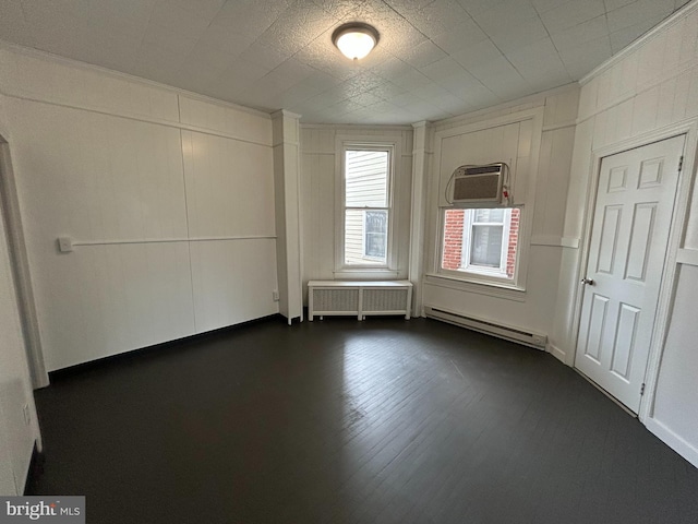 919 S Queen St, York, PA 17403 - unfurnished room featuring a baseboard radiator, radiator, and a wall mounted air conditioner