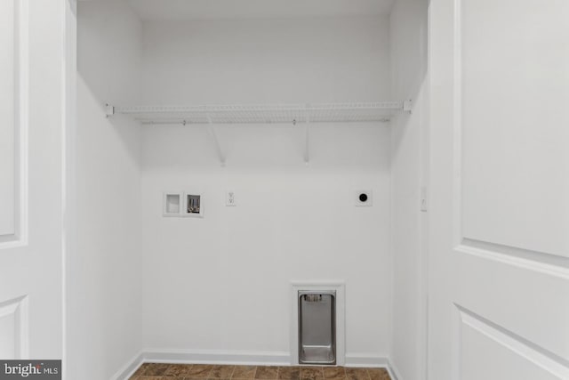 washroom featuring laundry area, hookup for an electric dryer, washer hookup, and baseboards