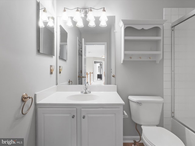 full bathroom featuring toilet and vanity