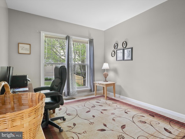office area featuring baseboards
