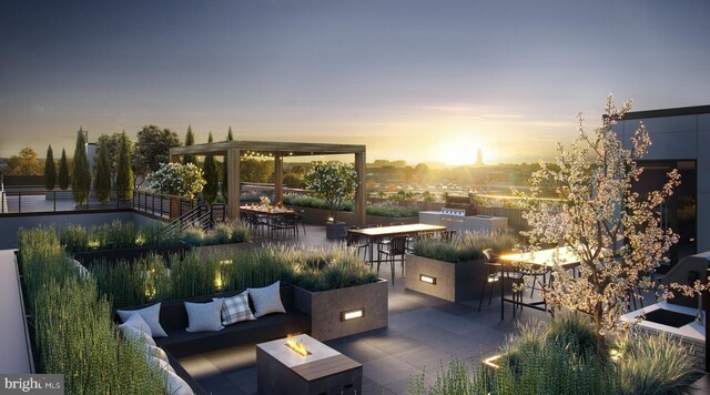 811 N Columbus St Unit 207, Alexandria, VA 22314 - view of patio / terrace with outdoor dry bar and an outdoor living space with a fire pit