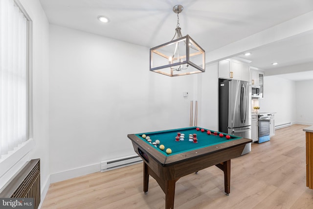 615 Salt Spray Rd Unit 3E, Ocean City, MD 21842 - rec room with baseboards, light wood-type flooring, a baseboard heating unit, and recessed lighting