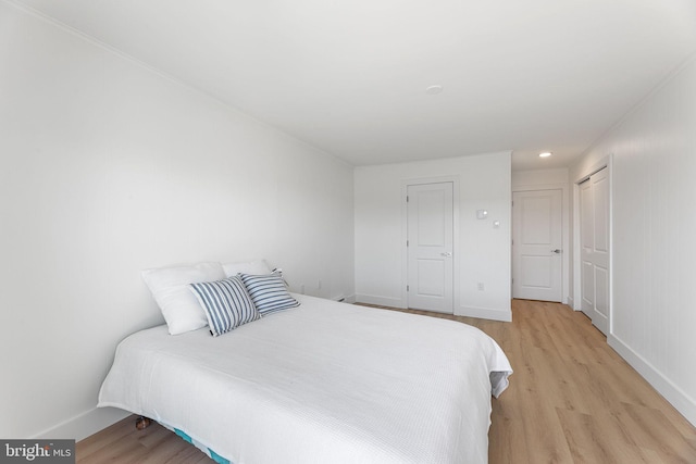615 Salt Spray Rd Unit 3E, Ocean City, MD 21842 - bedroom with light wood-style flooring, recessed lighting, and baseboards