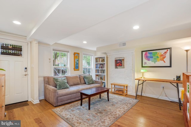 1809 12th St NW, Washington, DC 20009 - living room featuring light wood finished floors and recessed lighting