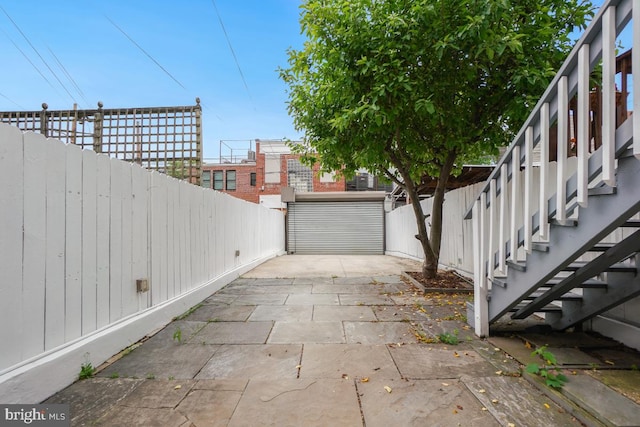 1809 12th St NW, Washington, DC 20009 - view of patio / terrace featuring stairs and a garage
