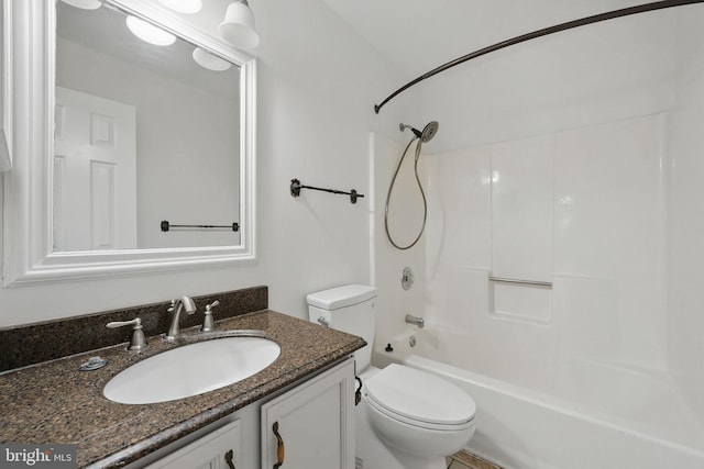 full bathroom with toilet, bathing tub / shower combination, and vanity