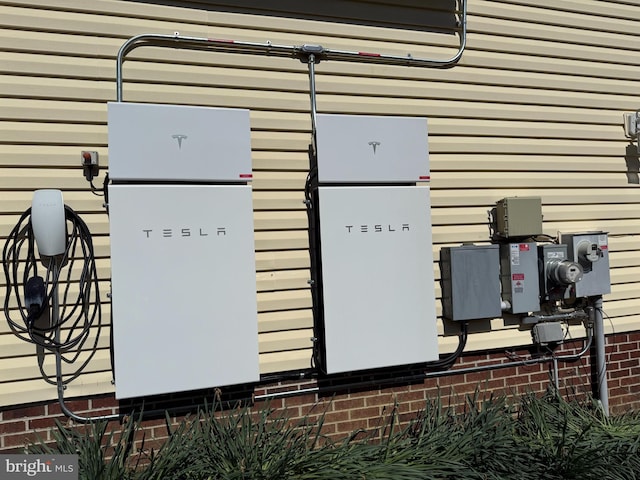 exterior details featuring electric meter