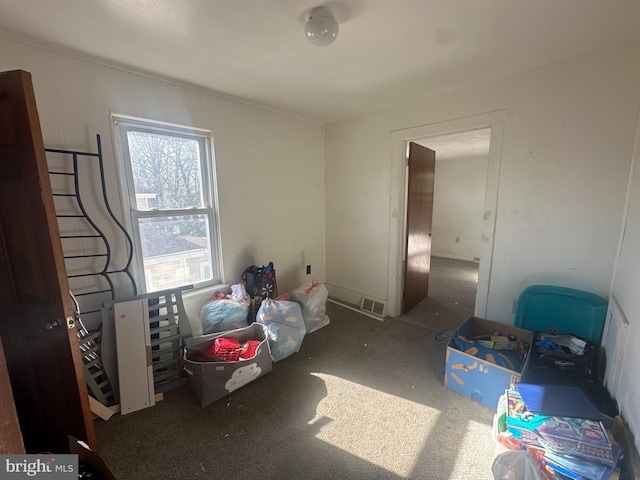 bedroom featuring visible vents