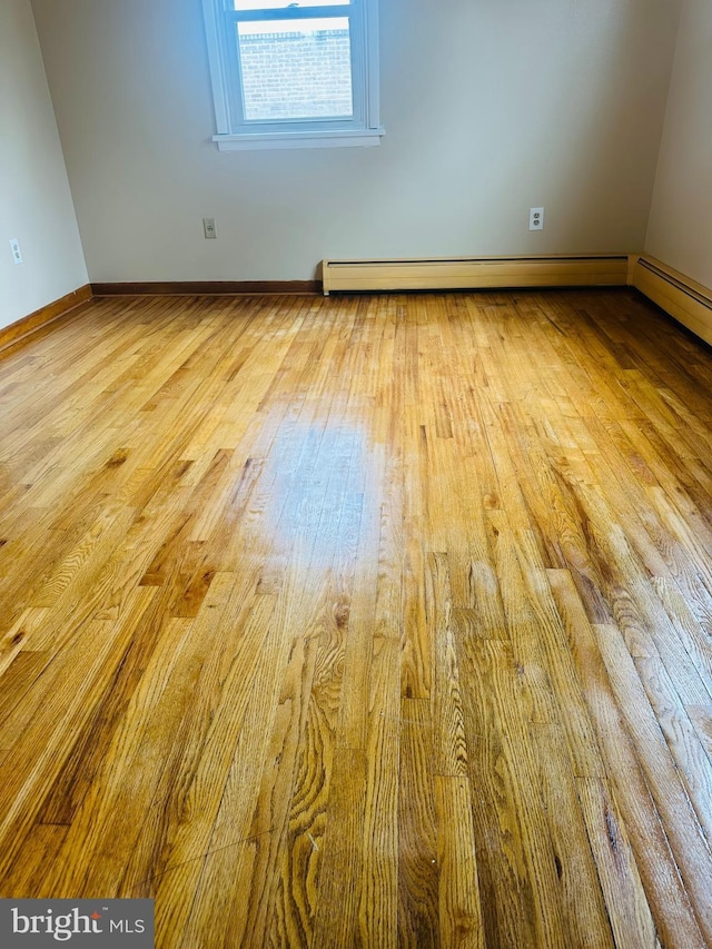 5001 Franklin St, Harrisburg, PA 17111 - empty room featuring baseboards and wood finished floors