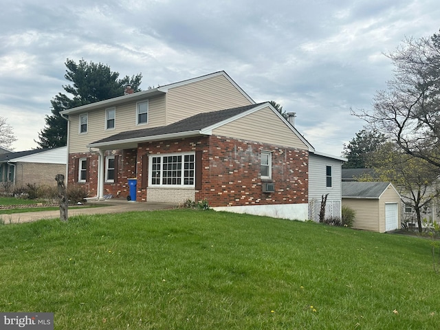5001 Franklin St, Harrisburg, PA 17111 - back of property with a yard and brick siding