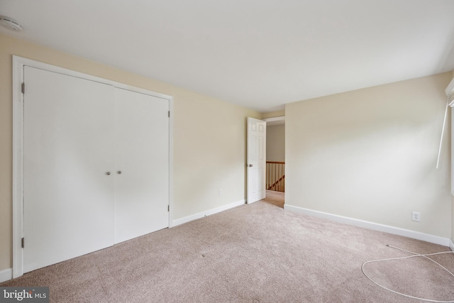 12430 Shadow Ln, Bowie, MD 20715 - unfurnished bedroom with carpet flooring, baseboards, and a closet