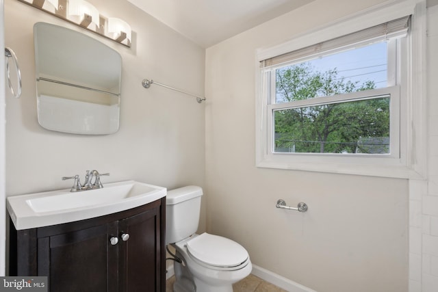 12430 Shadow Ln, Bowie, MD 20715 - bathroom with toilet, vanity, baseboards, and tile patterned floors