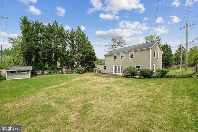 12430 Shadow Ln, Bowie, MD 20715 - view of yard with an outbuilding and french doors