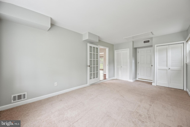 12430 Shadow Ln, Bowie, MD 20715 - unfurnished bedroom featuring attic access, two closets, carpet floors, and baseboards