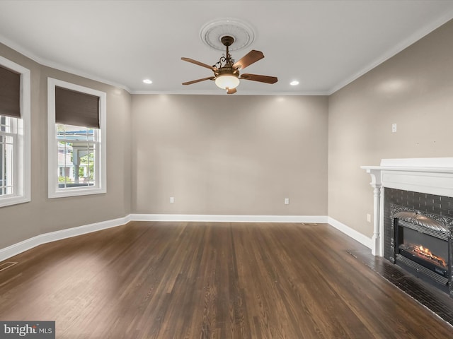 13 N Allegany St, Cumberland, MD 21502 - unfurnished living room with ornamental molding, a ceiling fan, a fireplace with flush hearth, dark wood-style floors, and recessed lighting