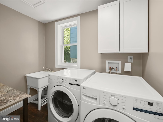 13 N Allegany St, Cumberland, MD 21502 - laundry room featuring washer and clothes dryer and cabinet space